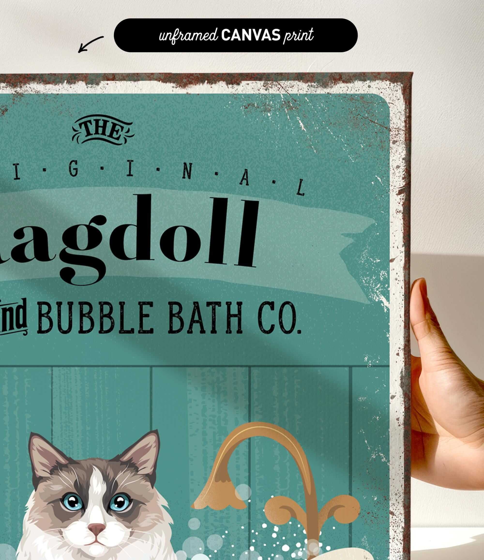 a hand holding a sign that says ragdol and bubble bath co