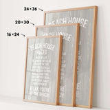 three framed signs with text, likely providing beach house rules or guidelines.