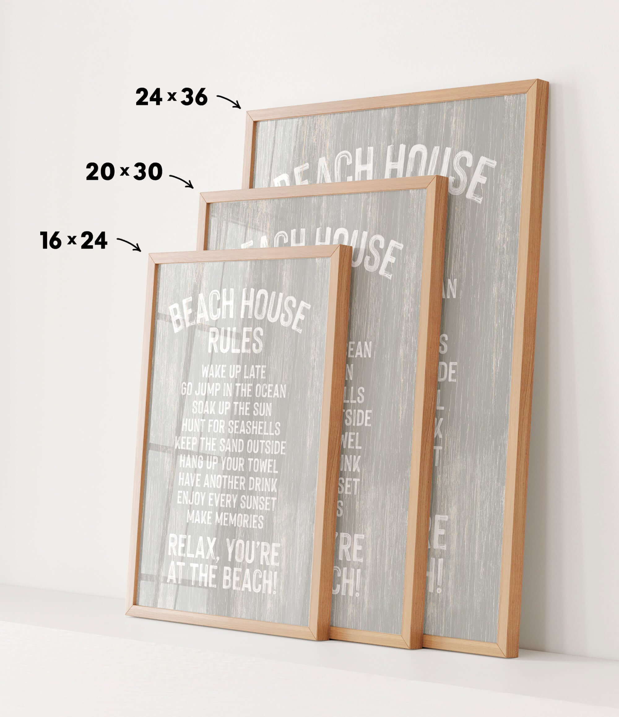 three framed signs with text, likely providing beach house rules or guidelines.