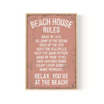 a sign that says beach house rules on it