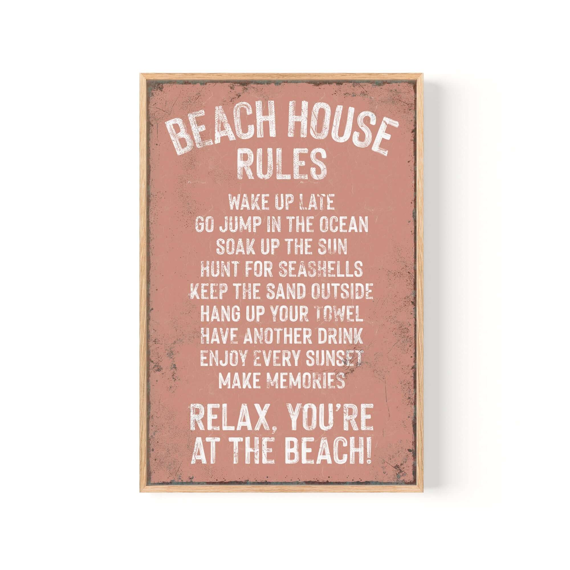 The Beach House Rules Sign features fun beach activities on a distressed coral background with rusted edges—perfect vintage home decor to add retro wall decor charm to any space.