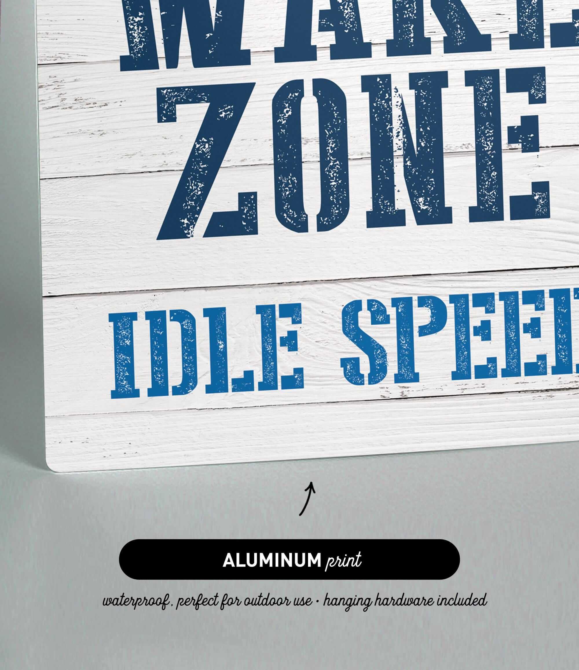 a sign that reads wake zone idle speed