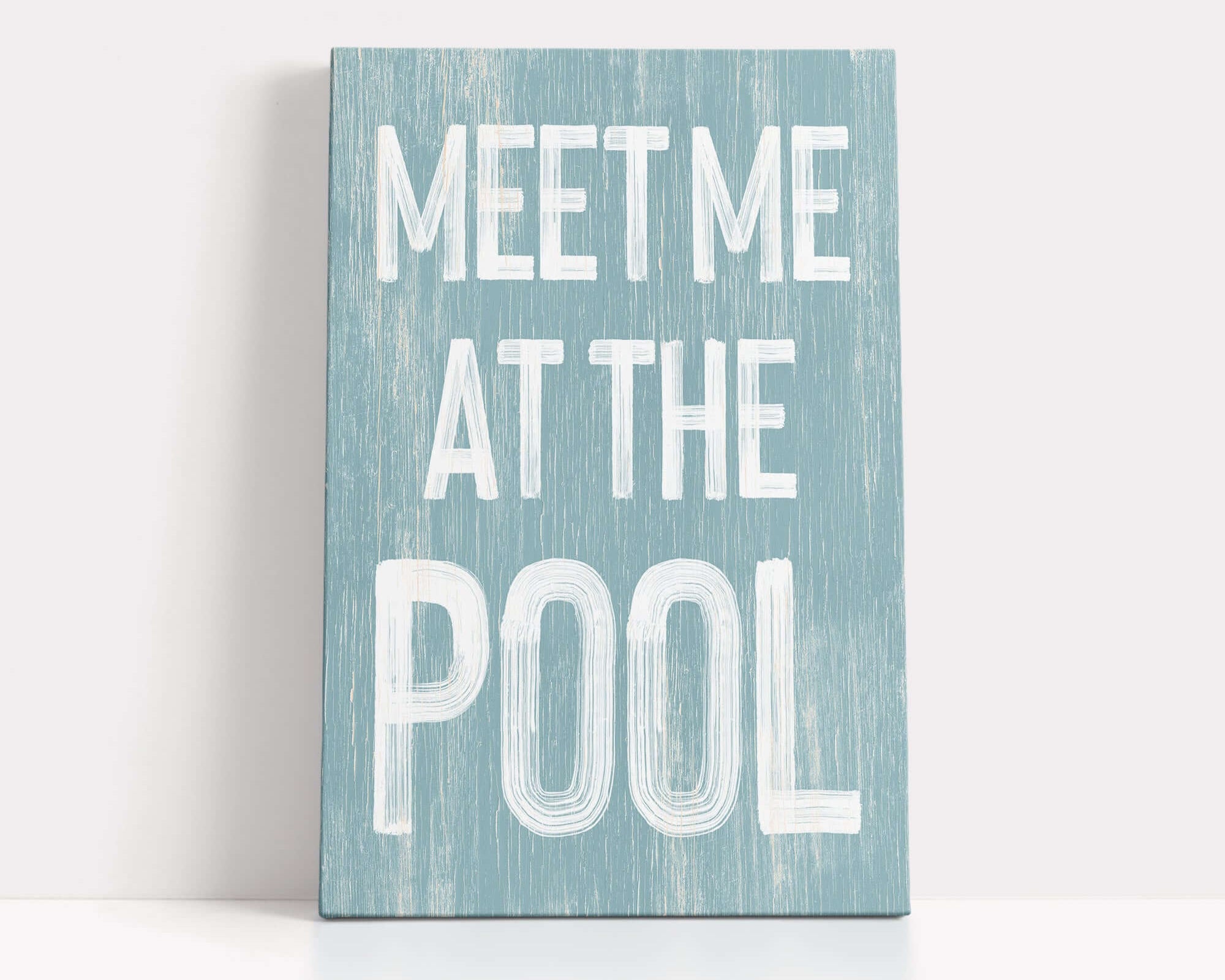 a wooden sign that says meet me at the pool