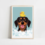 A framed illustration of a dog with a yellow rubber duck perched on its head, both surrounded by bubbles.