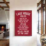 a red sign with white text that reads "LAKESHOUSE RULES" hanging on a white wall.