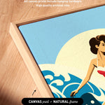 a woman surfing on a wave, with a wooden frame surrounding the artwork.