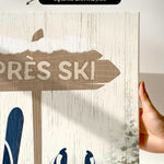a hand holding a sign that says tres ski