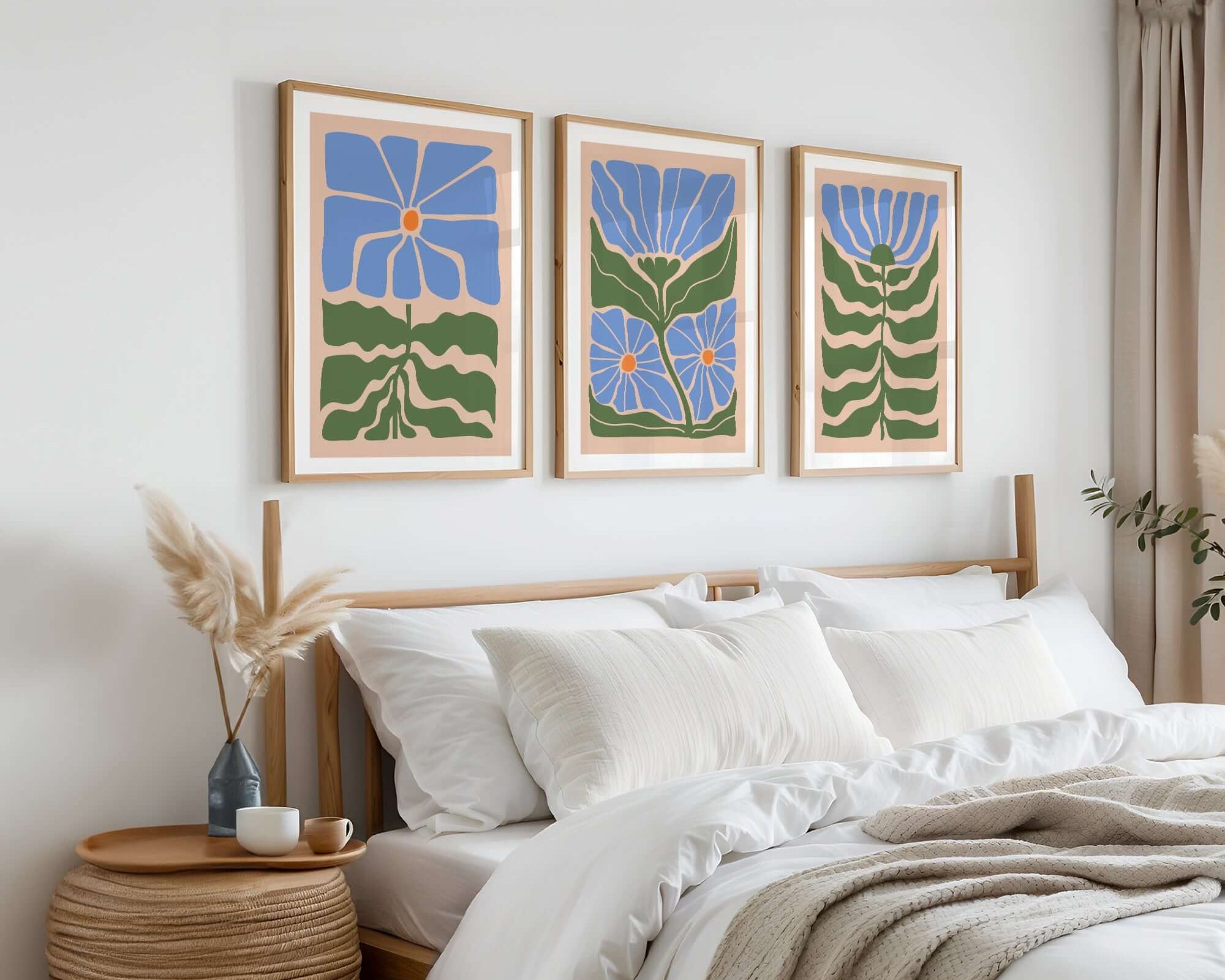 Cozy bedroom with white bedding, wooden bed, and the Flower Blocks Triptych | Set of Three Prints | 009 above the headboard—perfect for stylish home decor.
