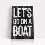 a wooden sign that says let&#39;s go on a boat