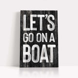 a wooden sign that says let&#39;s go on a boat