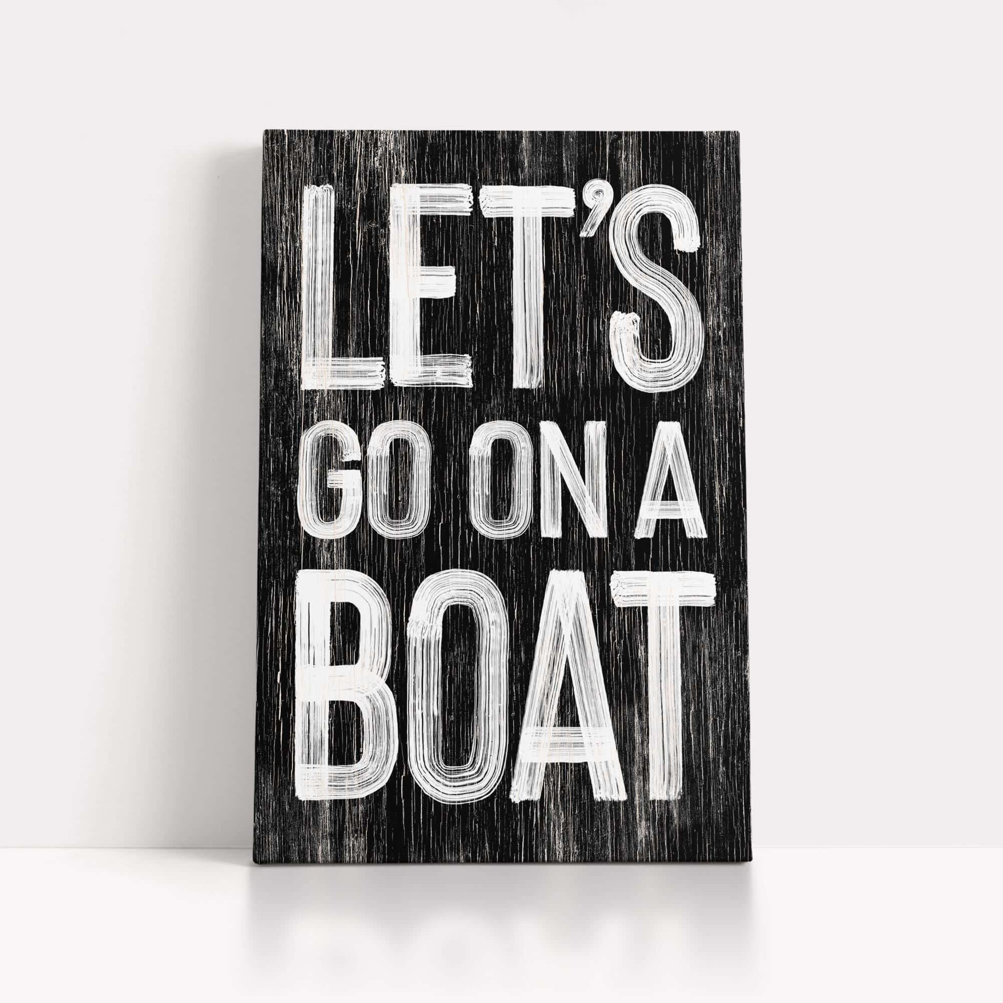 a wooden sign that says let's go on a boat