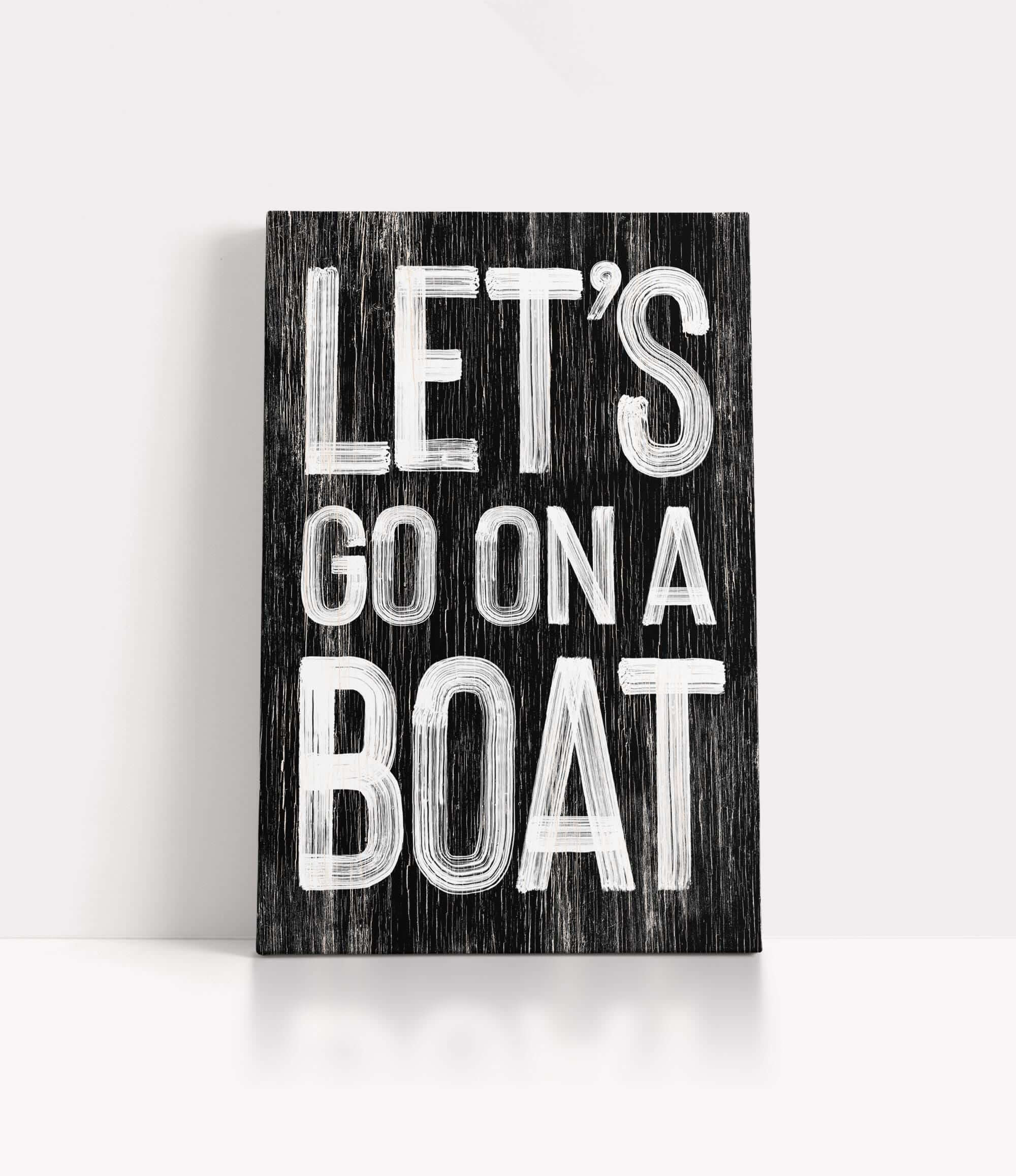 a wooden sign that says let&#39;s go on a boat