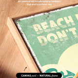 The image is a close-up of a framed artwork with a vintage-style design, featuring the text "REACH DON'T" prominently displayed.