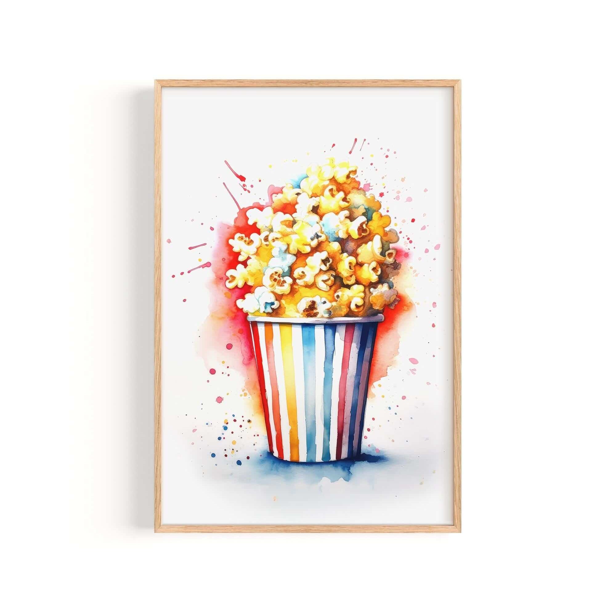 A framed watercolor painting depicting a colorful bucket filled with popcorn.