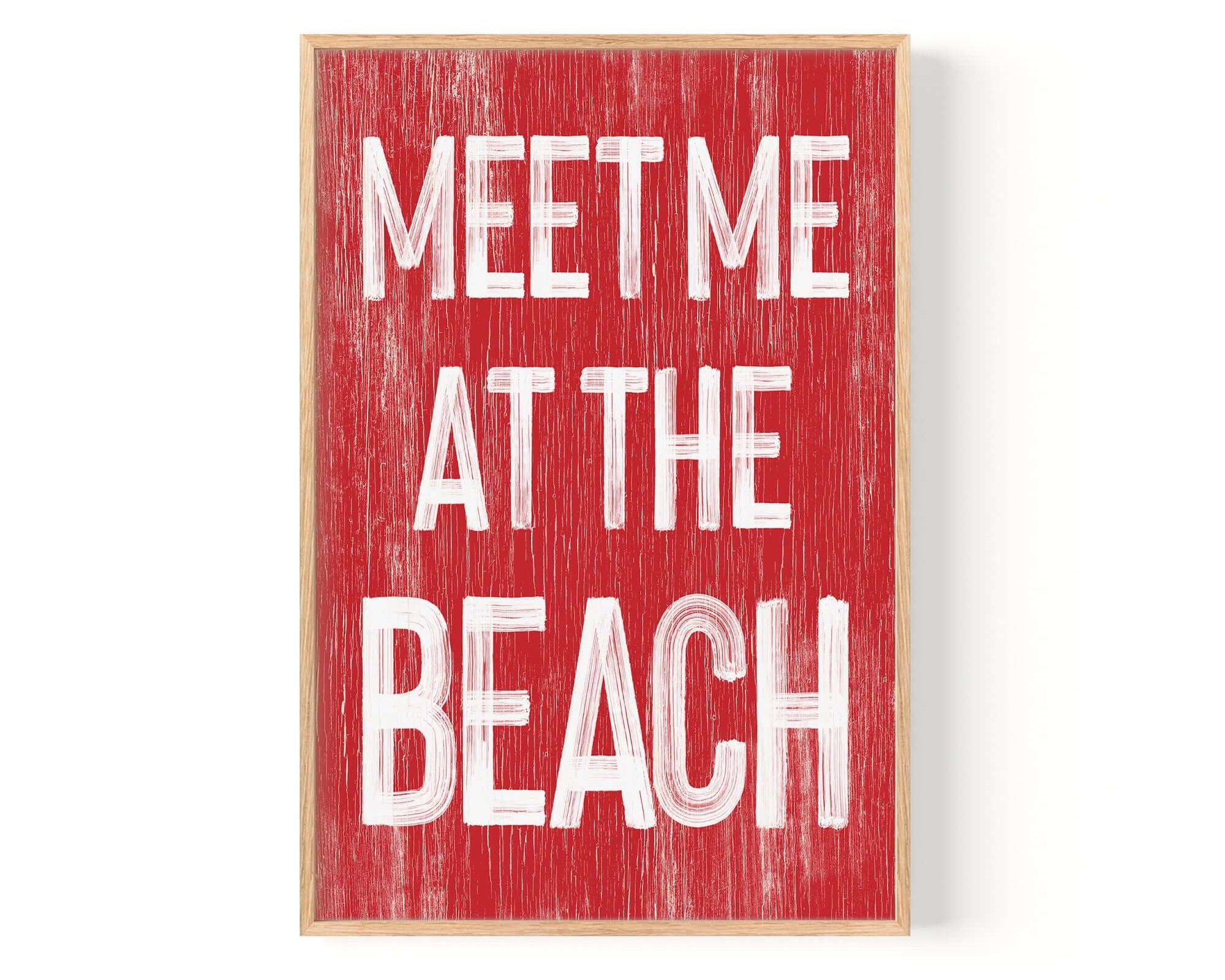 a red sign that says meet me at the beach