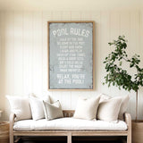a living room with a couch and a potted plant