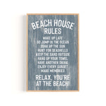 The Beach House Rules Sign, Painted Wood, Harbor Blue, features playful white text on a blue weathered background—the ideal coastal wall art to enhance your beach house decor.