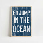 a blue and white poster with the words go jump in the ocean