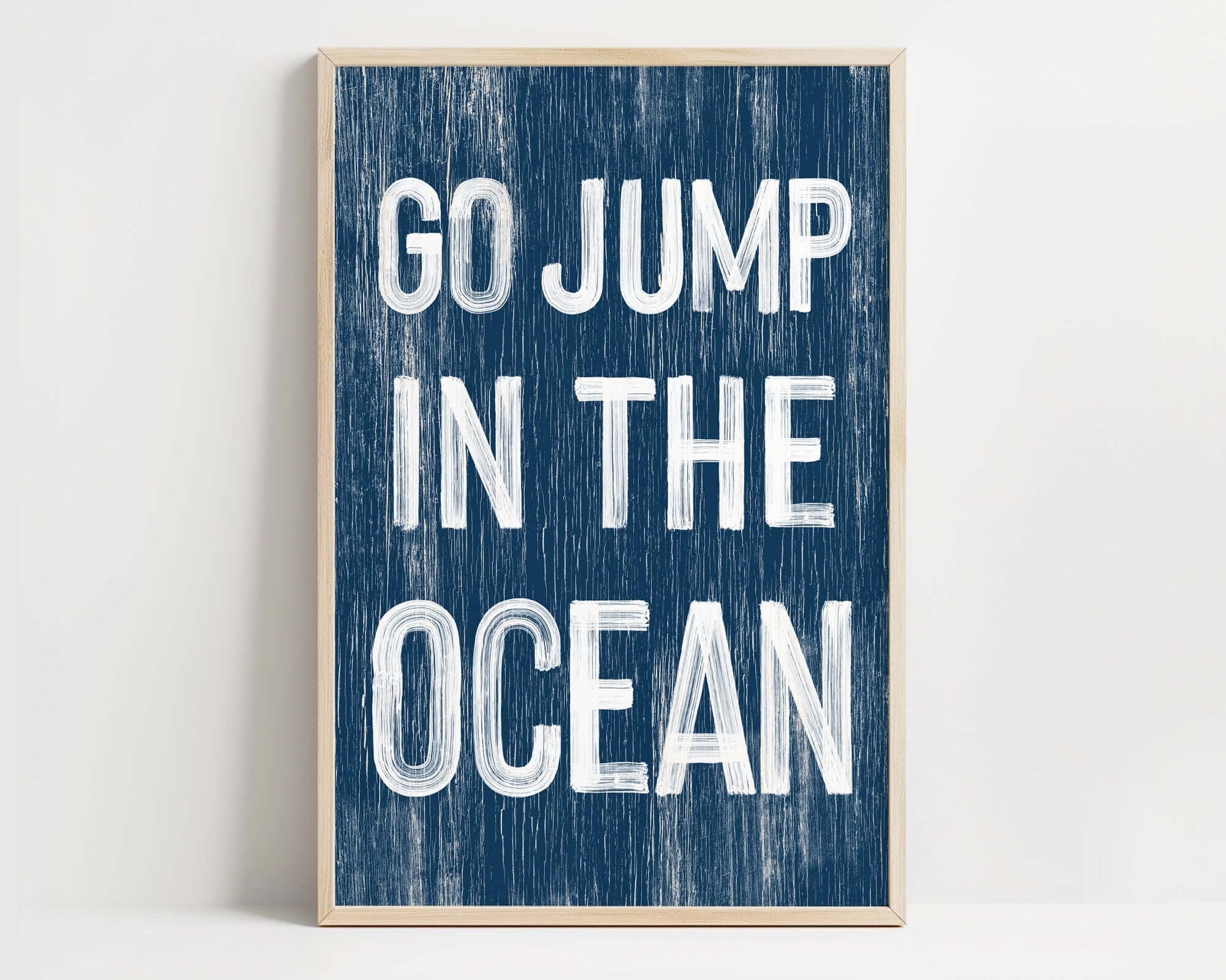 a blue and white poster with the words go jump in the ocean