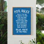 a blue sign hanging on the side of a wall