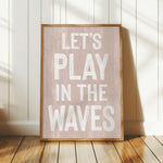 a wooden sign that says let&#39;s play in the waves