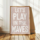 a wooden sign that says let&#39;s play in the waves