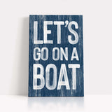 a wooden sign that says let&#39;s go on a boat