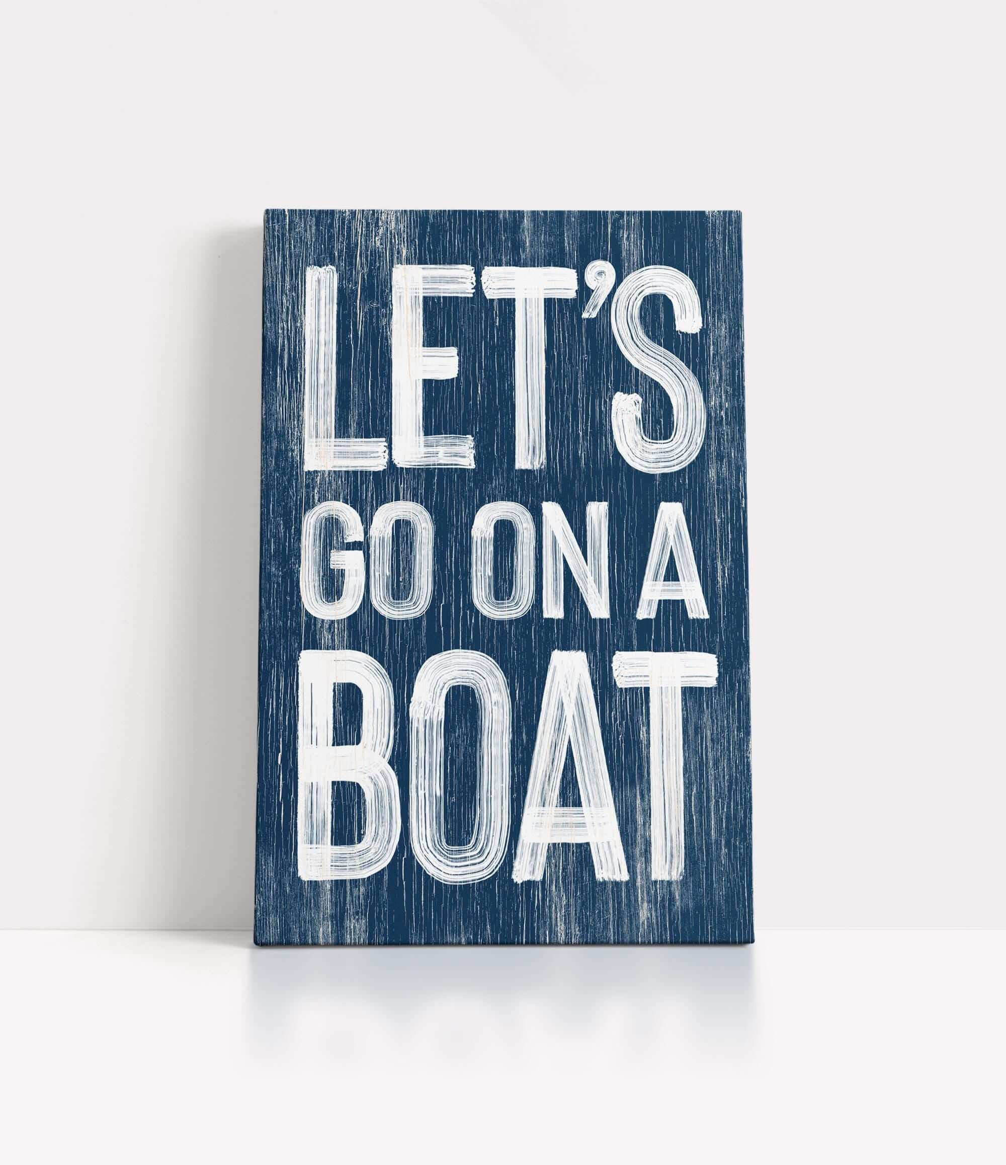 a wooden sign that says let&#39;s go on a boat