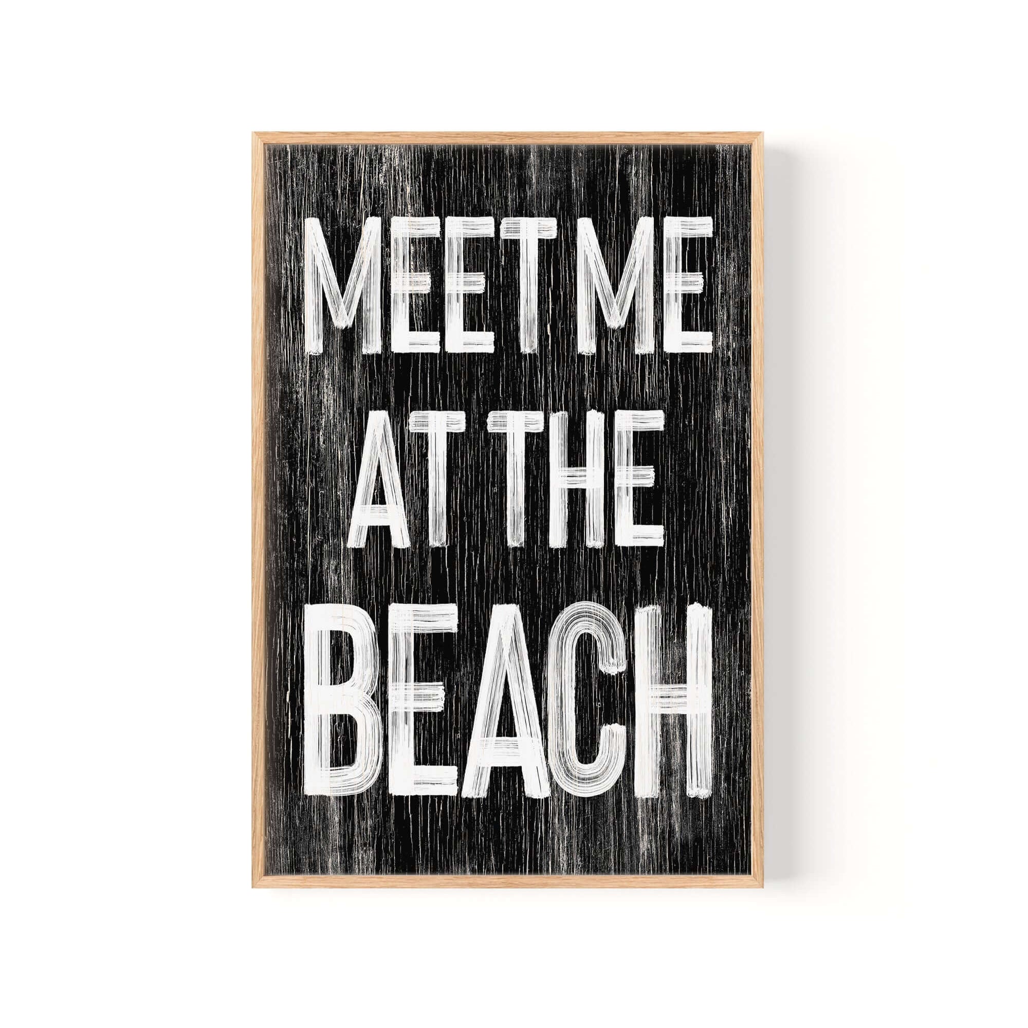 a black and white sign that says meet me at the beach