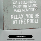 a sign that reads relax you&#39;re at the pool