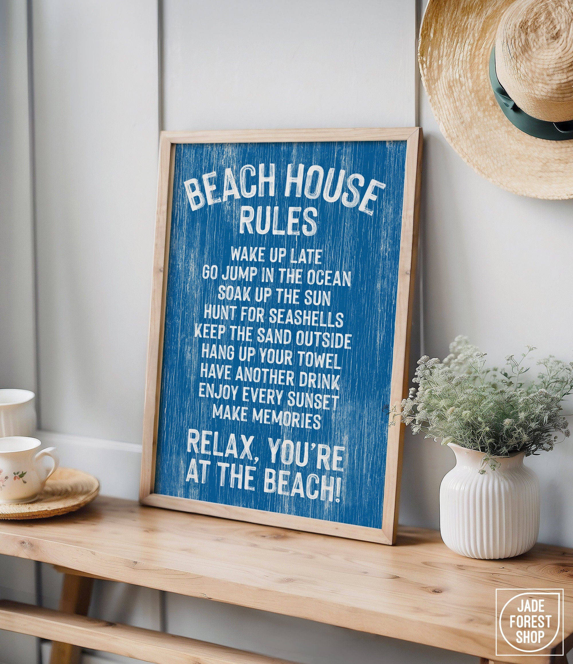 The Beach House Rules Sign, Painted Wood in Ocean Blue, features charming reminders and makes perfect coastal wall art for your shelf or beach home decor.