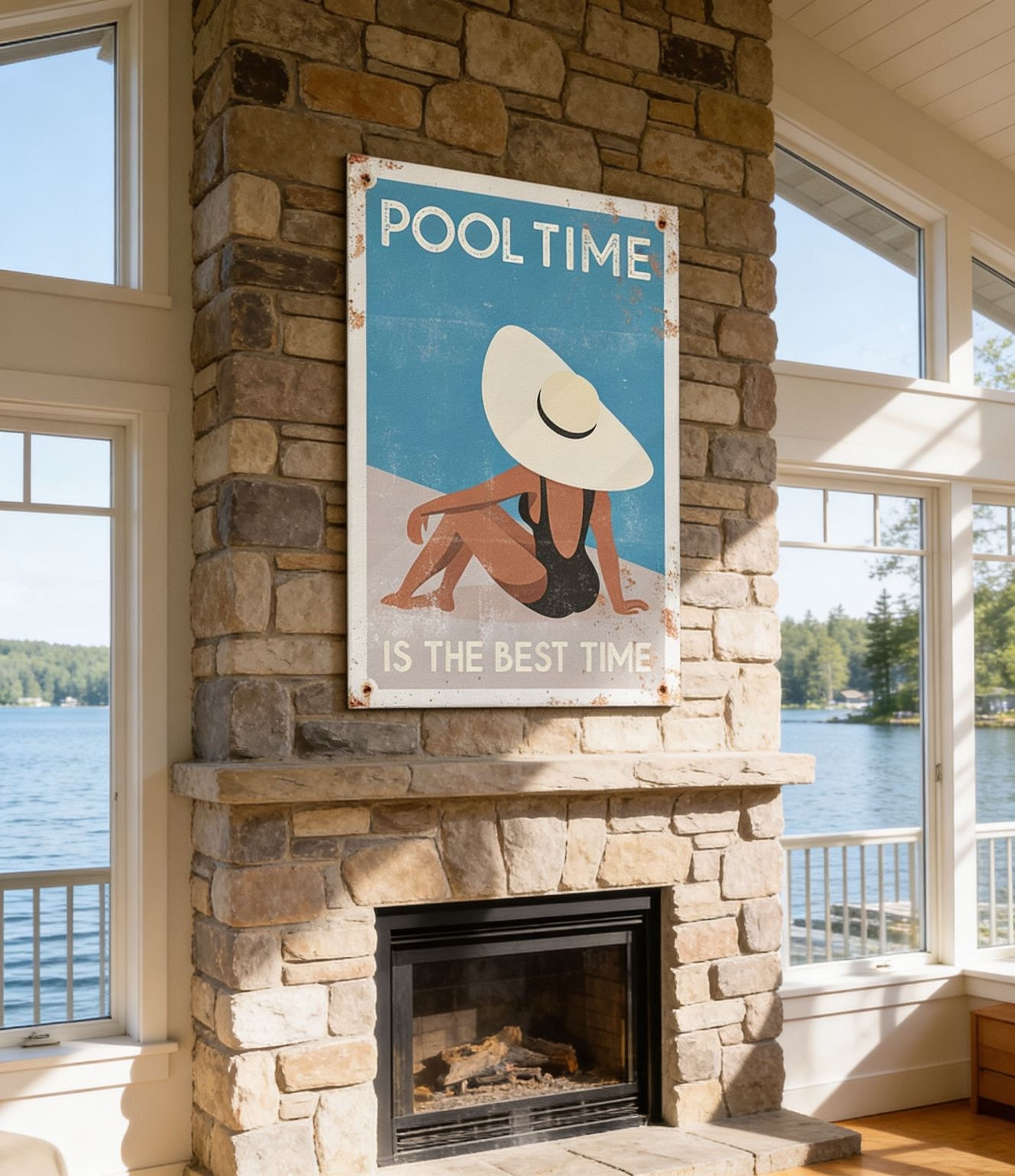 a fireplace with a framed poster of a woman in a hat and swimsuit above it, and a scenic view of a lake and trees outside the window.