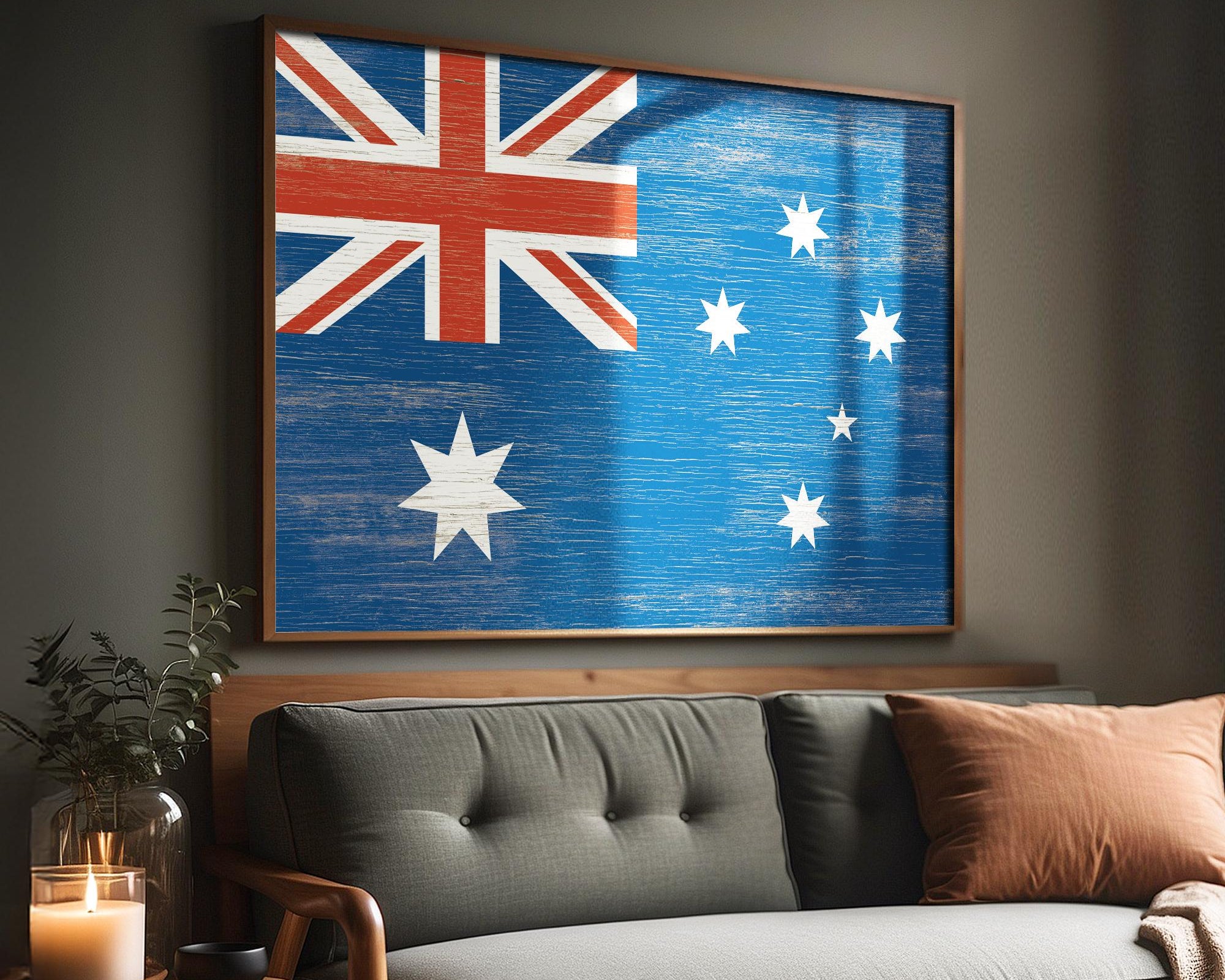 a living room with a couch and a painting on the wall