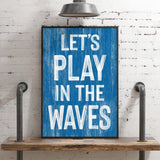 a blue sign that says let&#39;s play in the waves