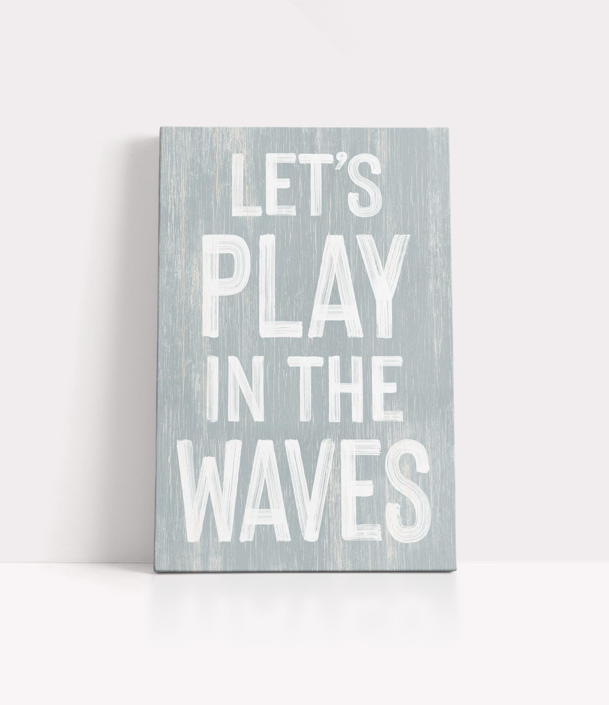 a wooden sign that says let&#39;s play in the waves
