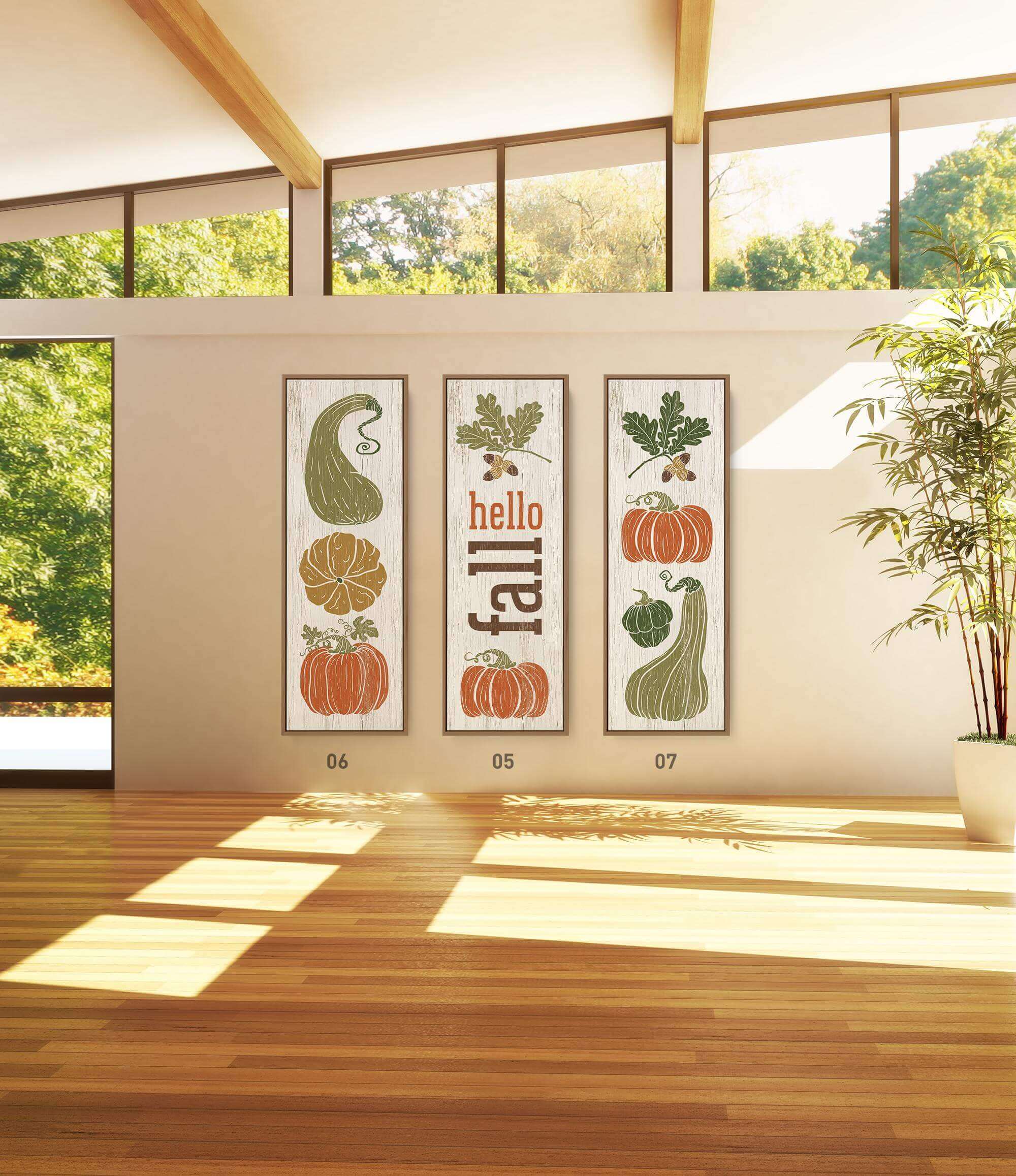 a room with a wooden floor and three posters on the wall