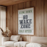 a living room with a poster on the wall
