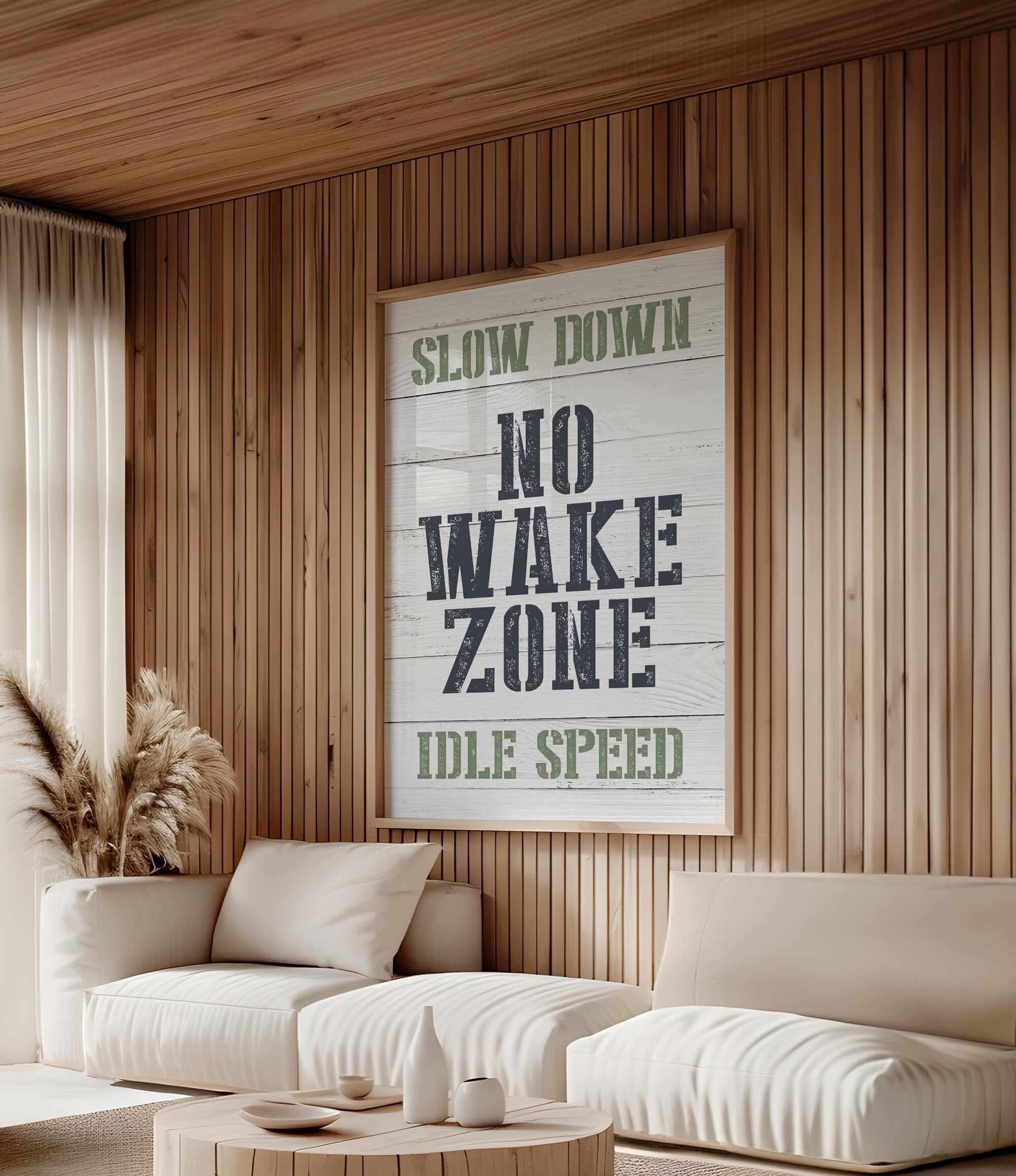 a living room with a poster on the wall