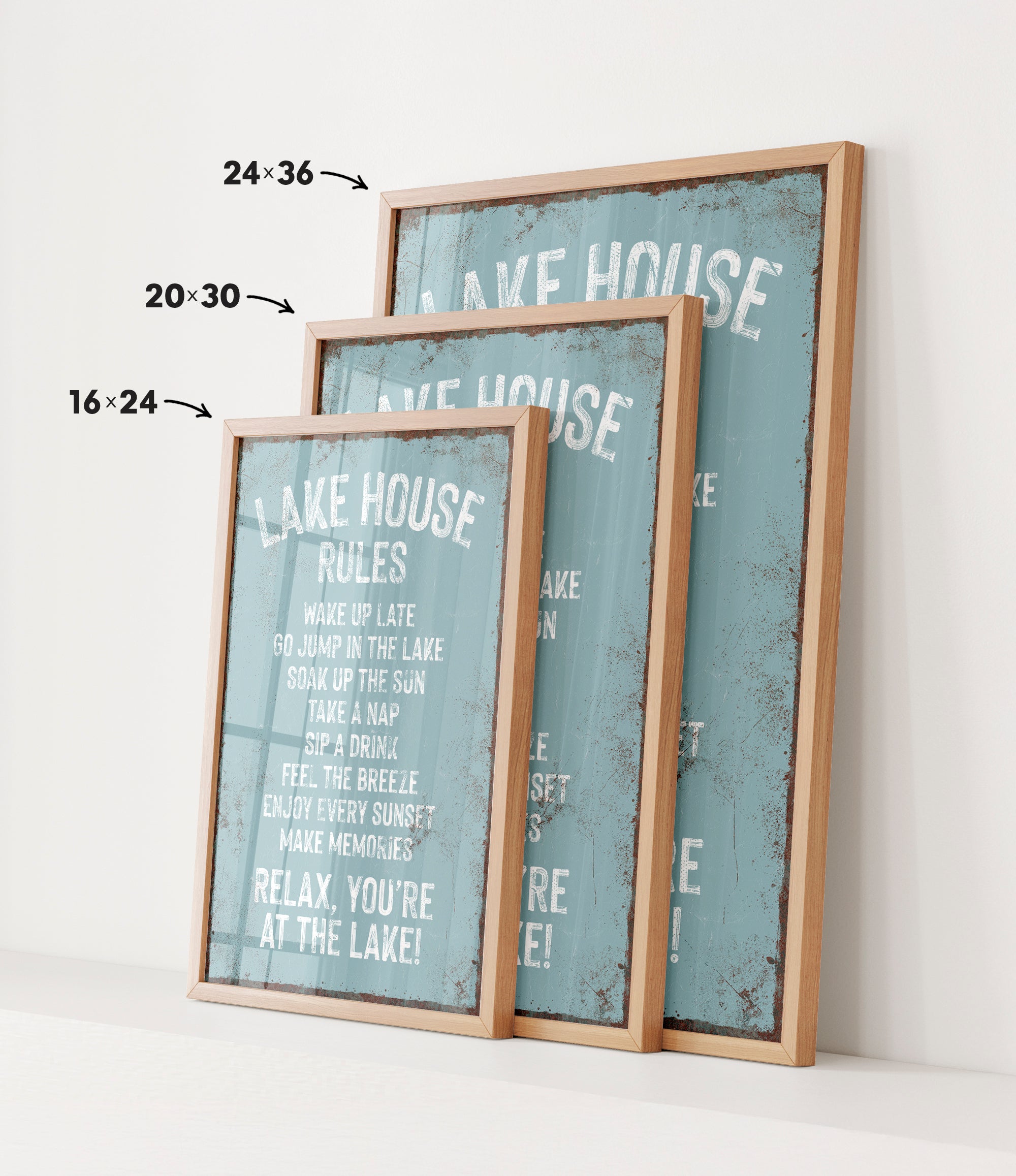 three framed signs with text, likely providing information or instructions related to a lake house or similar location.
