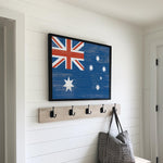 a picture of a flag hanging on a wall