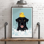 A framed illustration of a black dog with a yellow rubber duck on its head, set against a blue background with white bubbles.