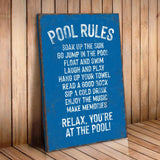 a pool rules sign on a wooden floor