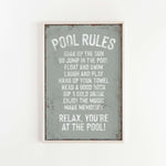 a sign that reads pool rules on a white wall