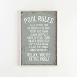 a sign that reads pool rules on a white wall