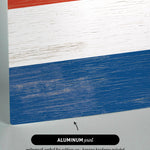 a close up of a piece of wood with a flag painted on it