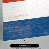 a close up of a piece of wood with a flag painted on it