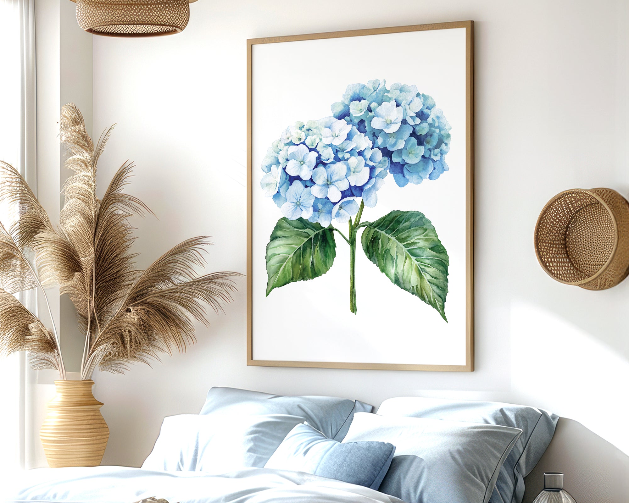 a serene bedroom scene with a large framed print of a blue hydrangea flower hanging on the wall above a bed with blue and white bedding. The room also features a woven basket, a potted plant, and a wooden nightstand with a vase.