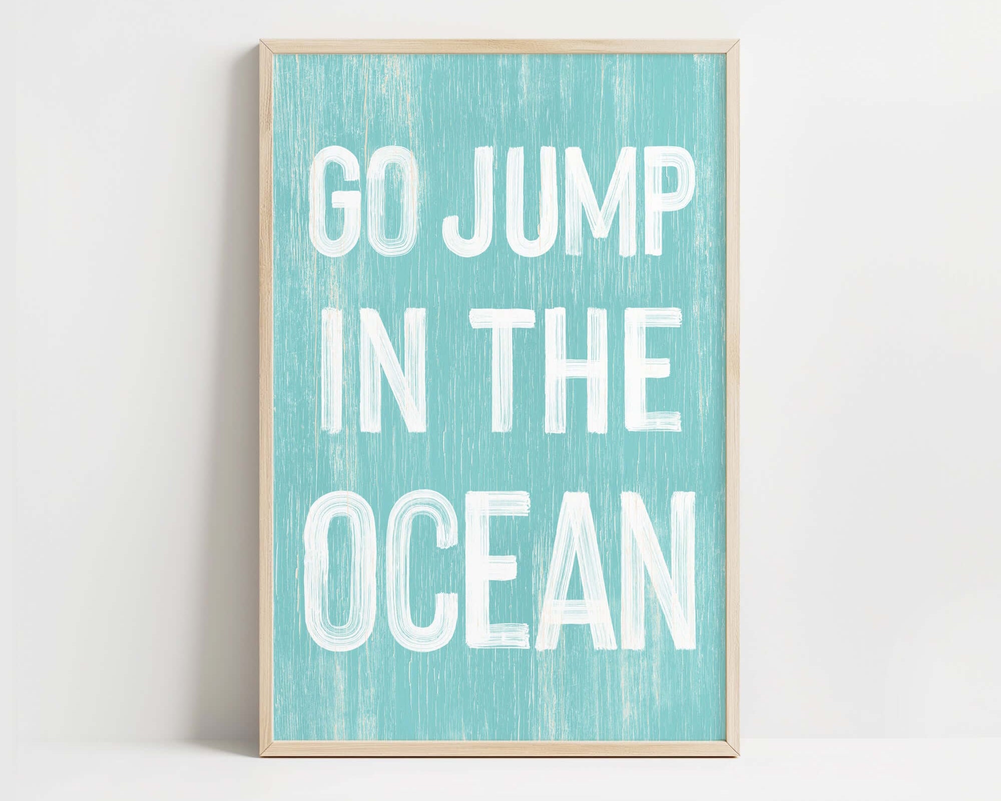 a blue and white print with the words go jump in the ocean