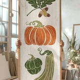 a person holding up a painting of vegetables
