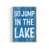 a blue sign that says go jump in the lake